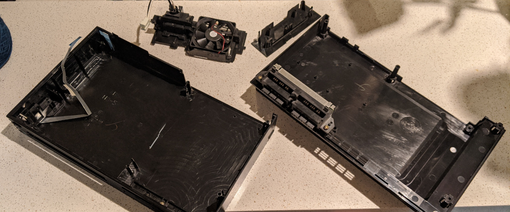 The disassembled PlayStation 2 shell
